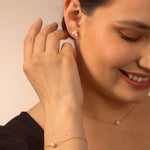 White pearl chocker and white single pearl bracelet and white clover pearl studs