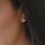 Gold clover pearl studs
