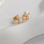 Gold clover pearl studs