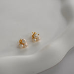 Gold clover pearl studs