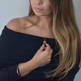 Gold disc pendant necklace