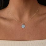 Silver disc pendant necklace