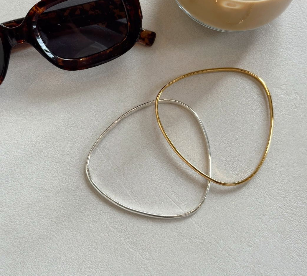 silver and gold vermeil signature bangles